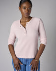 Feel fabulous every day in the 'Petal' Henley Top, crafted for those who love versatile style.