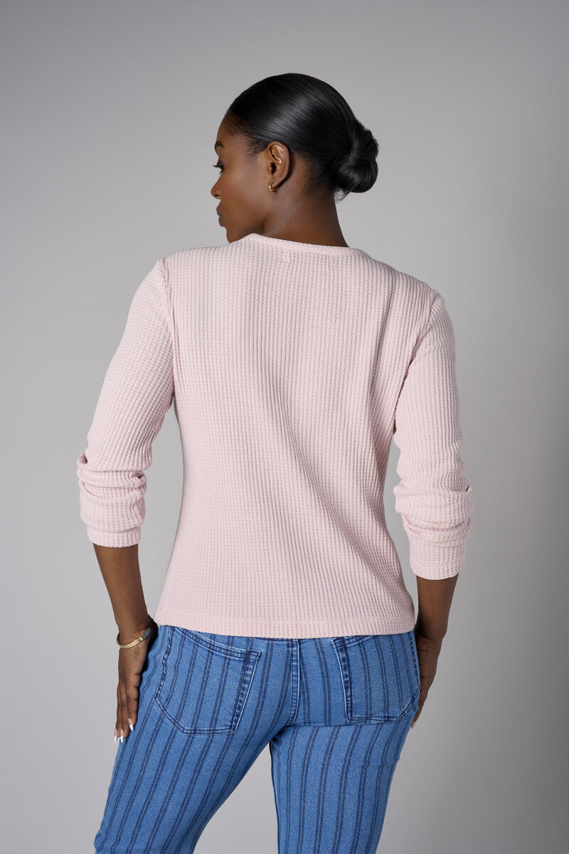 Feel fabulous every day in the 'Petal' Henley Top, crafted for those who love versatile style.