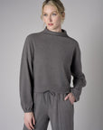 Love your look in the refreshing 'Gray' Funnel Neck Top.