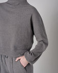 Love your look in the refreshing 'Gray' Funnel Neck Top.