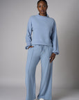 A stunning twist: the 'Sky' Funnel Neck Top brings freshness to your style.