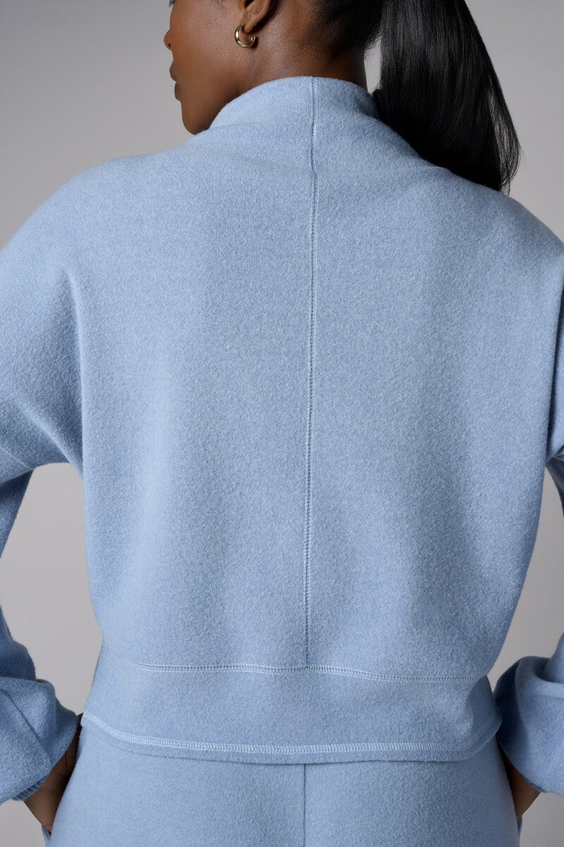 A stunning twist: the 'Sky' Funnel Neck Top brings freshness to your style.
