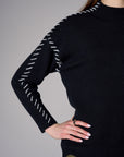 Black Lutetia long sleeve whipstitch sweater with mock turtleneck
