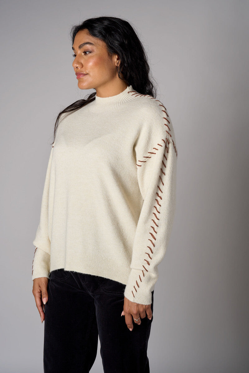 Bone White Lutetia long sleeve whipstitch sweater with mock turtleneck