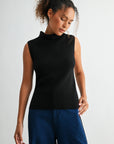 Black sleeveless turtleneck sweater