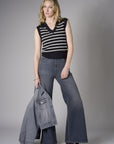 Redefine chic with the 'Black' Sleeveless Sweater – the perfect finishing touch.