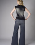 Redefine chic with the 'Black' Sleeveless Sweater – the perfect finishing touch.