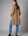 Brown cardigan with denim collar and button front closure.