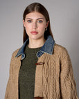 Brown cardigan with denim collar and button front closure.