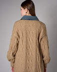 Brown cardigan with denim collar and button front closure.