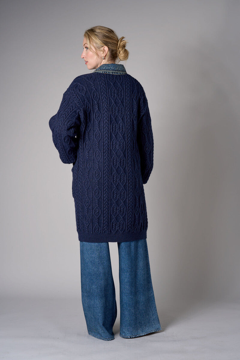 Twilight cardigan with denim collar and button front closure.