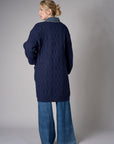 Twilight cardigan with denim collar and button front closure.