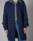 Twilight cardigan with denim collar and button front closure.