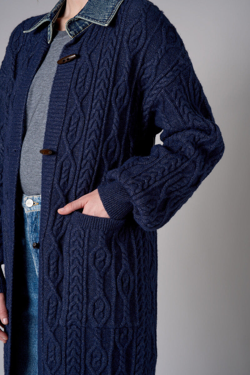 Twilight cardigan with denim collar and button front closure.