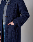 Twilight cardigan with denim collar and button front closure.
