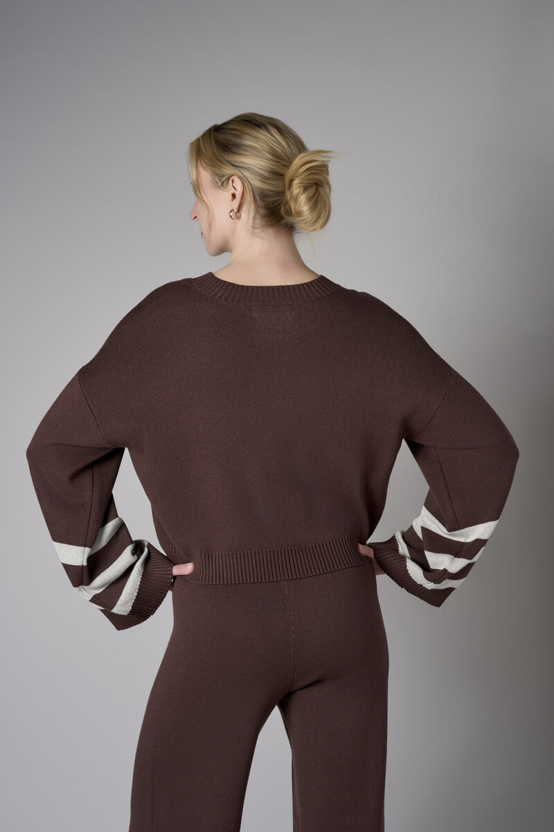 Inject your wardrobe with the vivid 'Earth' Striped Sleeve Sweater.