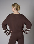 Inject your wardrobe with the vivid 'Earth' Striped Sleeve Sweater.