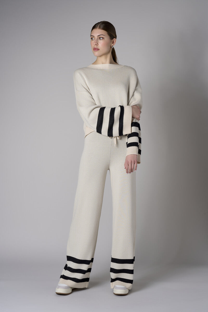 The 'Sand' Striped Sleeve Sweater: designed for bold appeal.