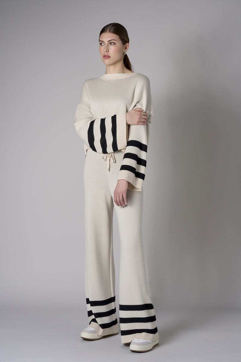 The 'Sand' Striped Sleeve Sweater: designed for bold appeal.