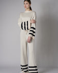 The 'Sand' Striped Sleeve Sweater: designed for bold appeal.