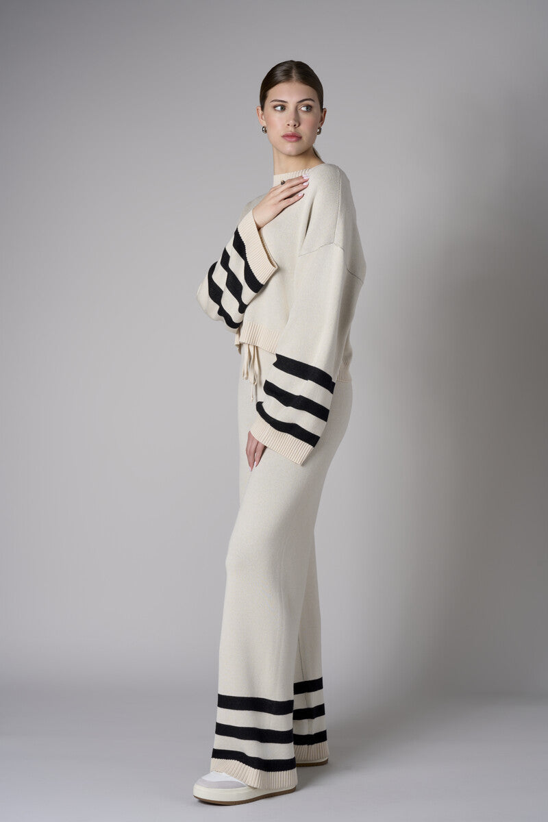 The 'Sand' Striped Sleeve Sweater: designed for bold appeal.