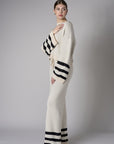The 'Sand' Striped Sleeve Sweater: designed for bold appeal.