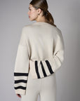 The 'Sand' Striped Sleeve Sweater: designed for bold appeal.