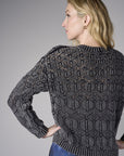 Turn heads with this warm 'Black' Crew Neck Distressed Sweater.