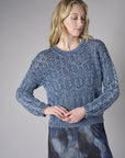 Showcase your personality with the Crew Neck Distressed Sweater in striking 'Indigo'.