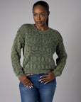 Fall in love with the distinctive 'Olive' Crew Neck Distressed Sweater – a must-have for any wardrobe.