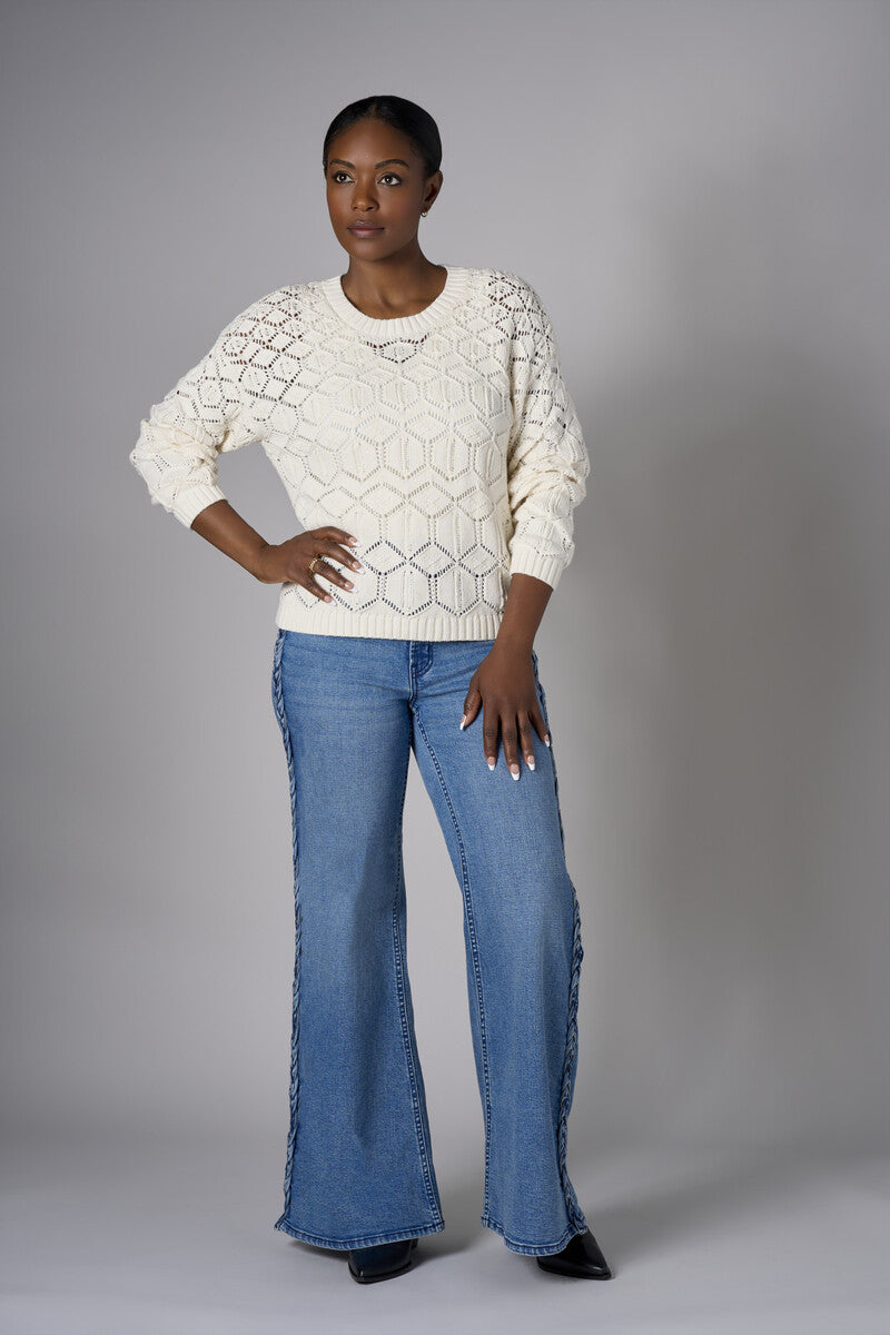 Embrace the beauty of 'Sand' in our signature Crew Neck Distressed Sweater.