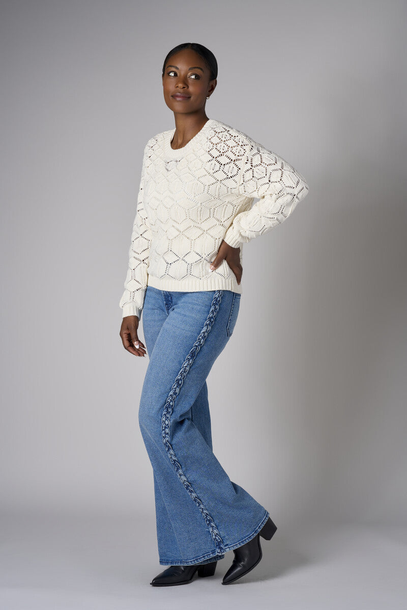Embrace the beauty of 'Sand' in our signature Crew Neck Distressed Sweater.