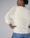 Embrace the beauty of 'Sand' in our signature Crew Neck Distressed Sweater.