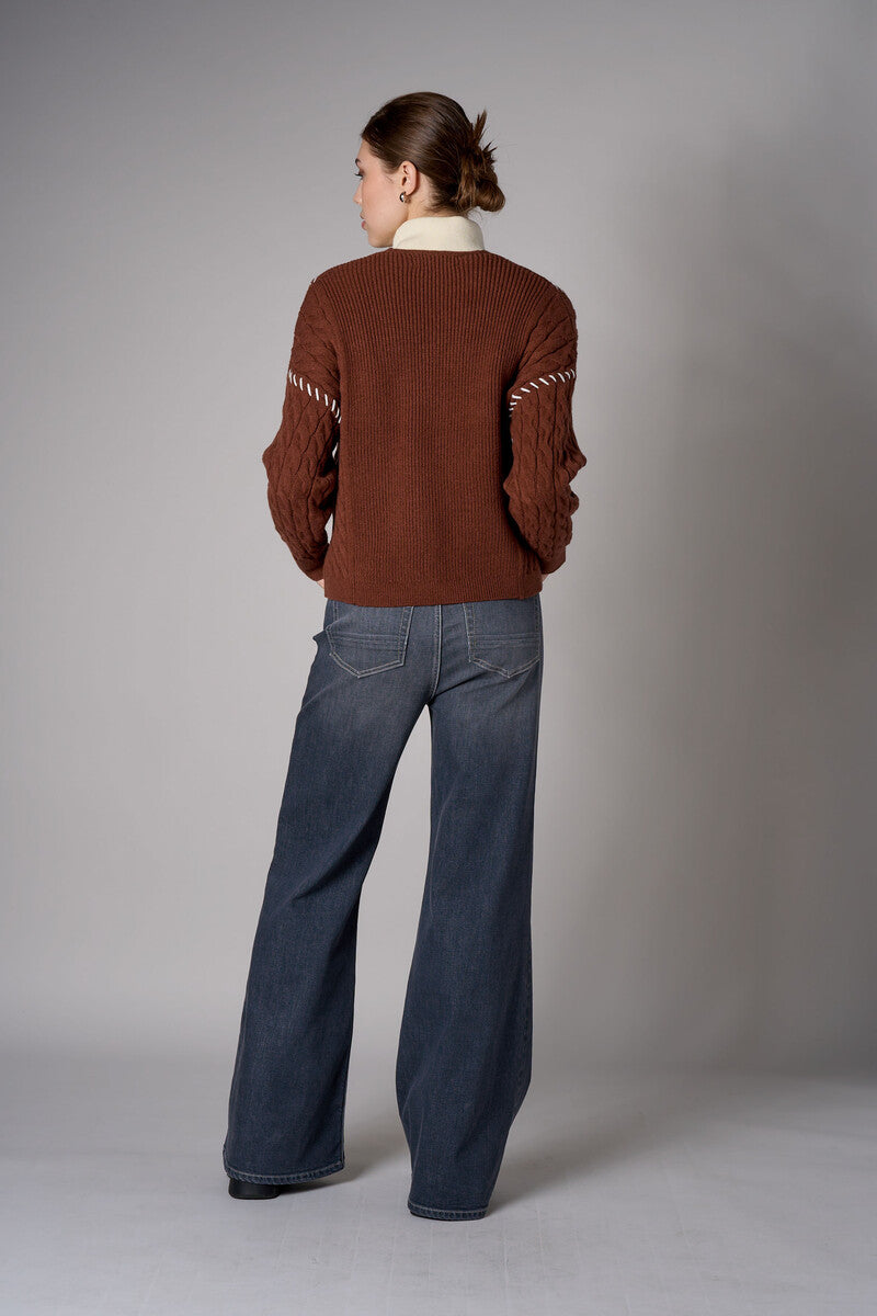 brown cardigan with contrast whipstitch trim and button front closure.