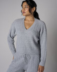 Add sophistication with the refreshing 'Gray' Cable Knit Sweater.