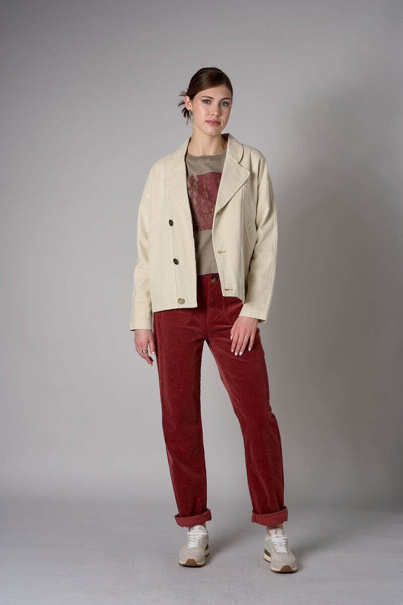 Bone White Retro Denim Jacket with angled paneling and button front closure.