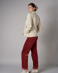 Bone White Retro Denim Jacket with angled paneling and button front closure.