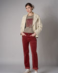 Bone White Retro Denim Jacket with angled paneling and button front closure.