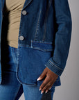 Two tone denim blazer with button front closure and front flap pockets.