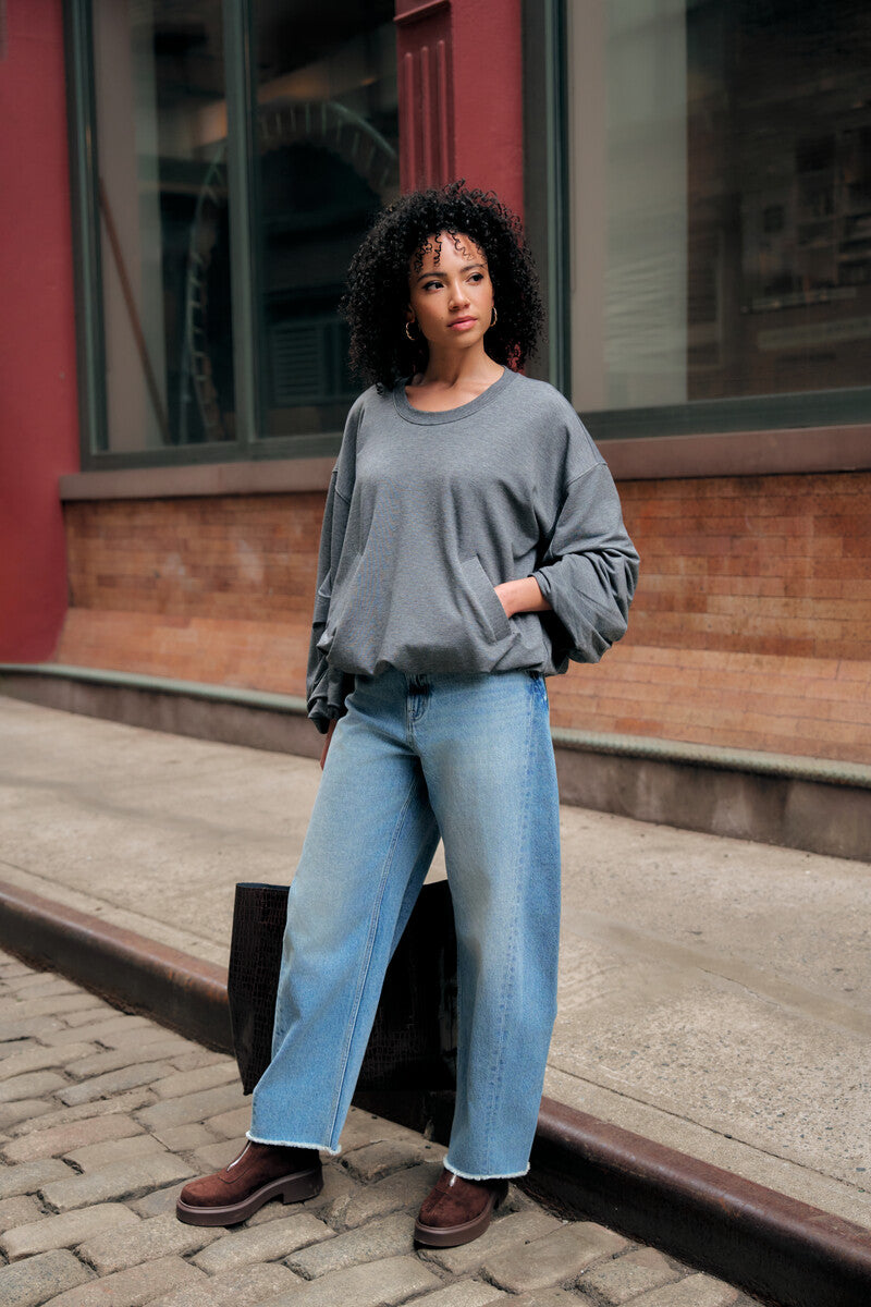 Experience the bold look of our 'Vintage Whisker Wash' Barrel Leg Jean.