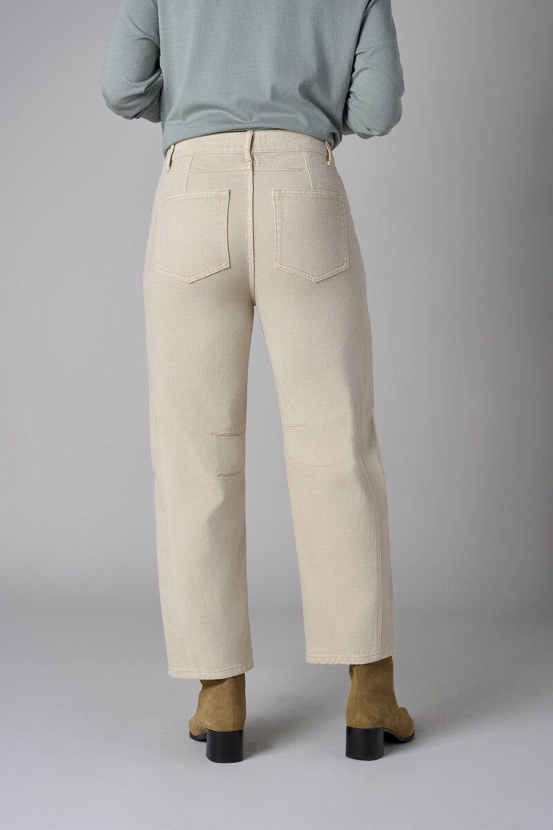 Make a statement in our refined 'Bone White Denim' Slim Barrel Leg Jean.