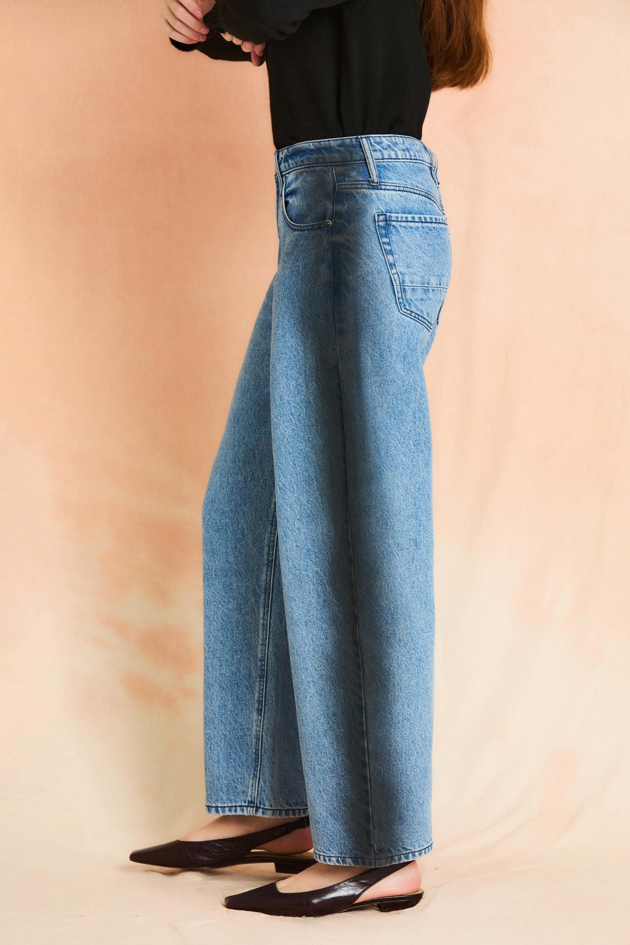 Vintage Wash Crescent Leg Jean