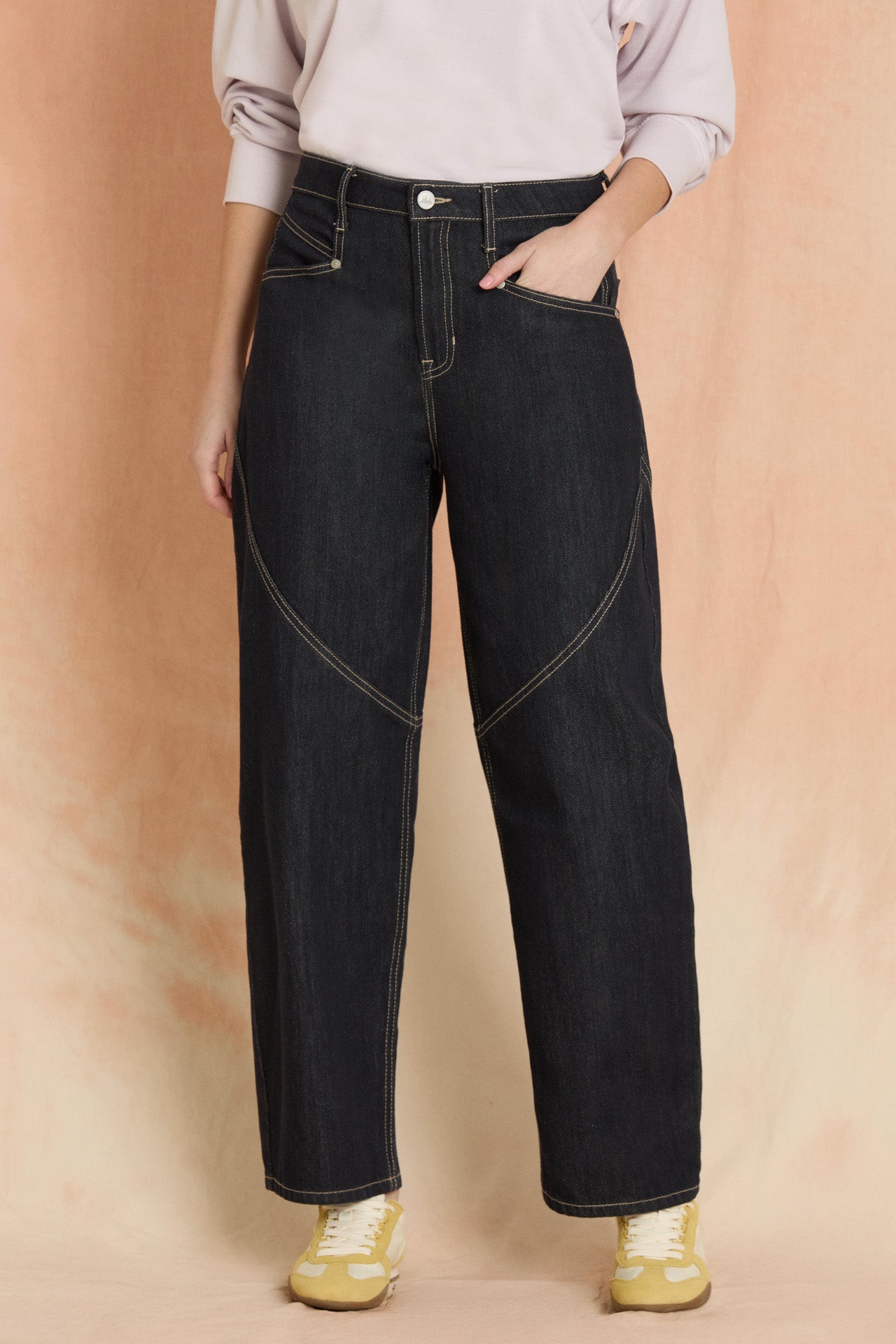 Indigo Spliced Seam Crescent Leg Jean