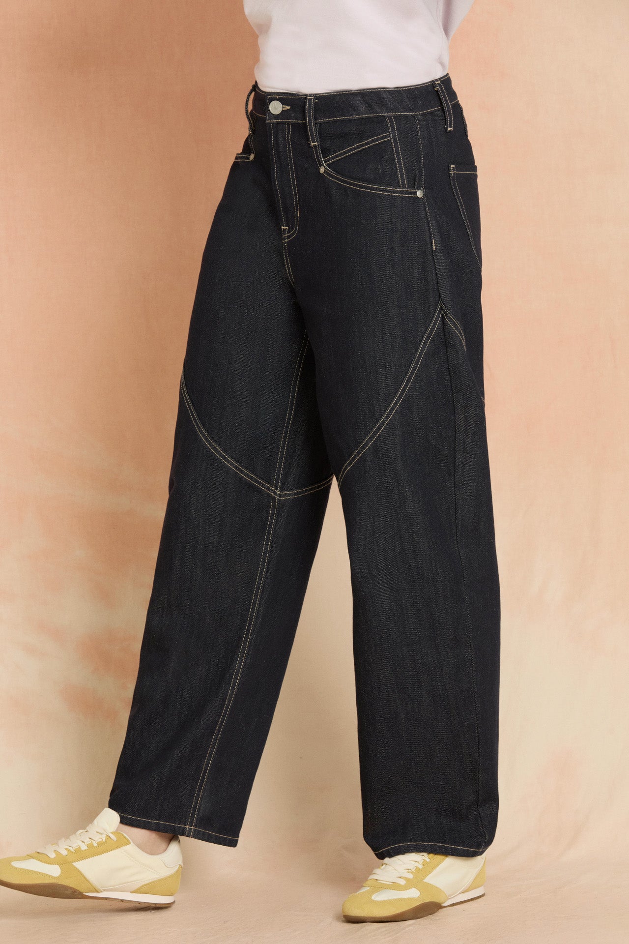 Indigo Spliced Seam Crescent Leg Jean