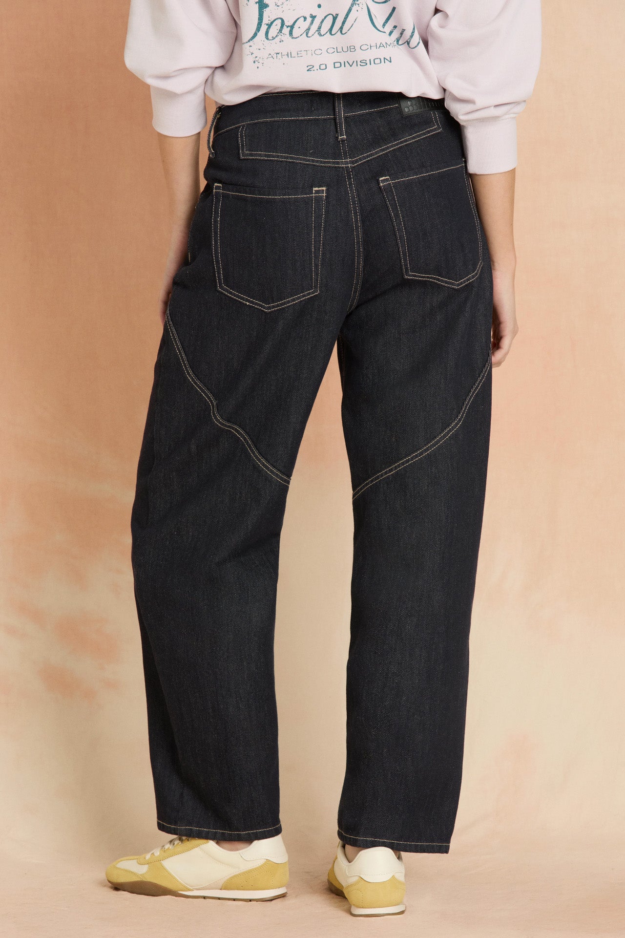 Indigo Spliced Seam Crescent Leg Jean