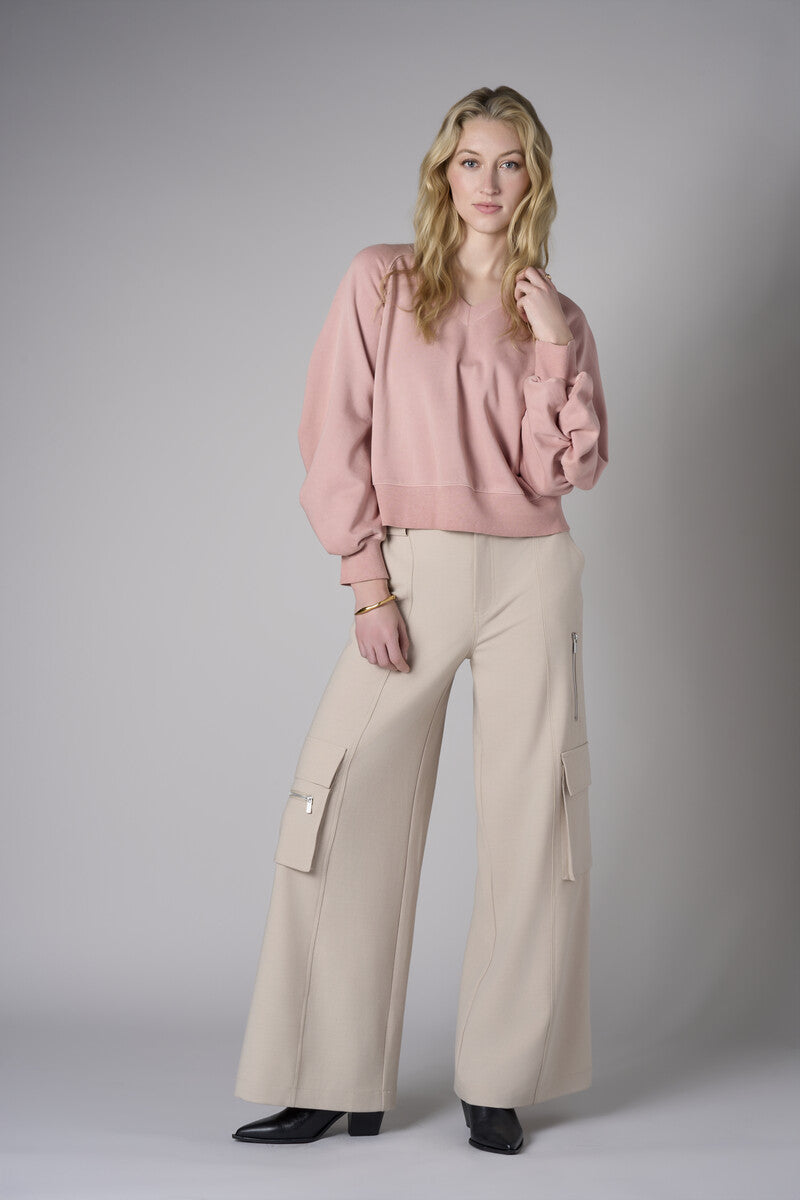 Experience the premium look of our 'Rose' Zipper Back V-Neck Sweatshirt.