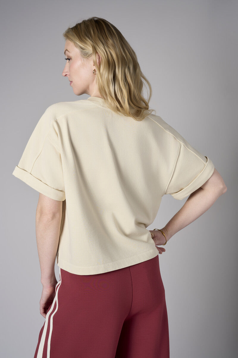 Redefine chic with the 'Bone White' Brie Sweatshirt – the perfect finishing touch.
