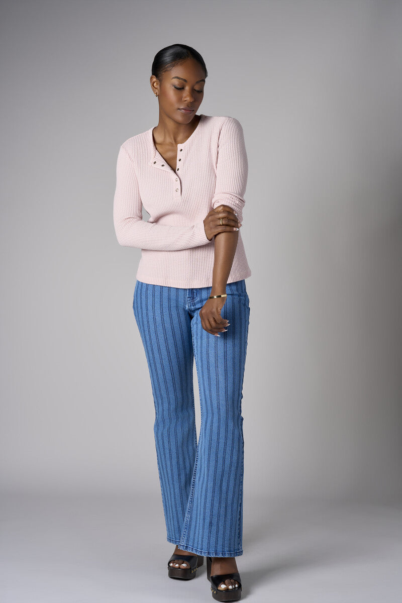 Feel fabulous every day in the &#39;Petal&#39; Henley Top, crafted for those who love versatile style.