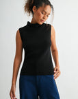 Black sleeveless turtleneck sweater