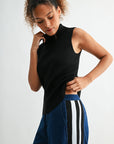 Black sleeveless turtleneck sweater